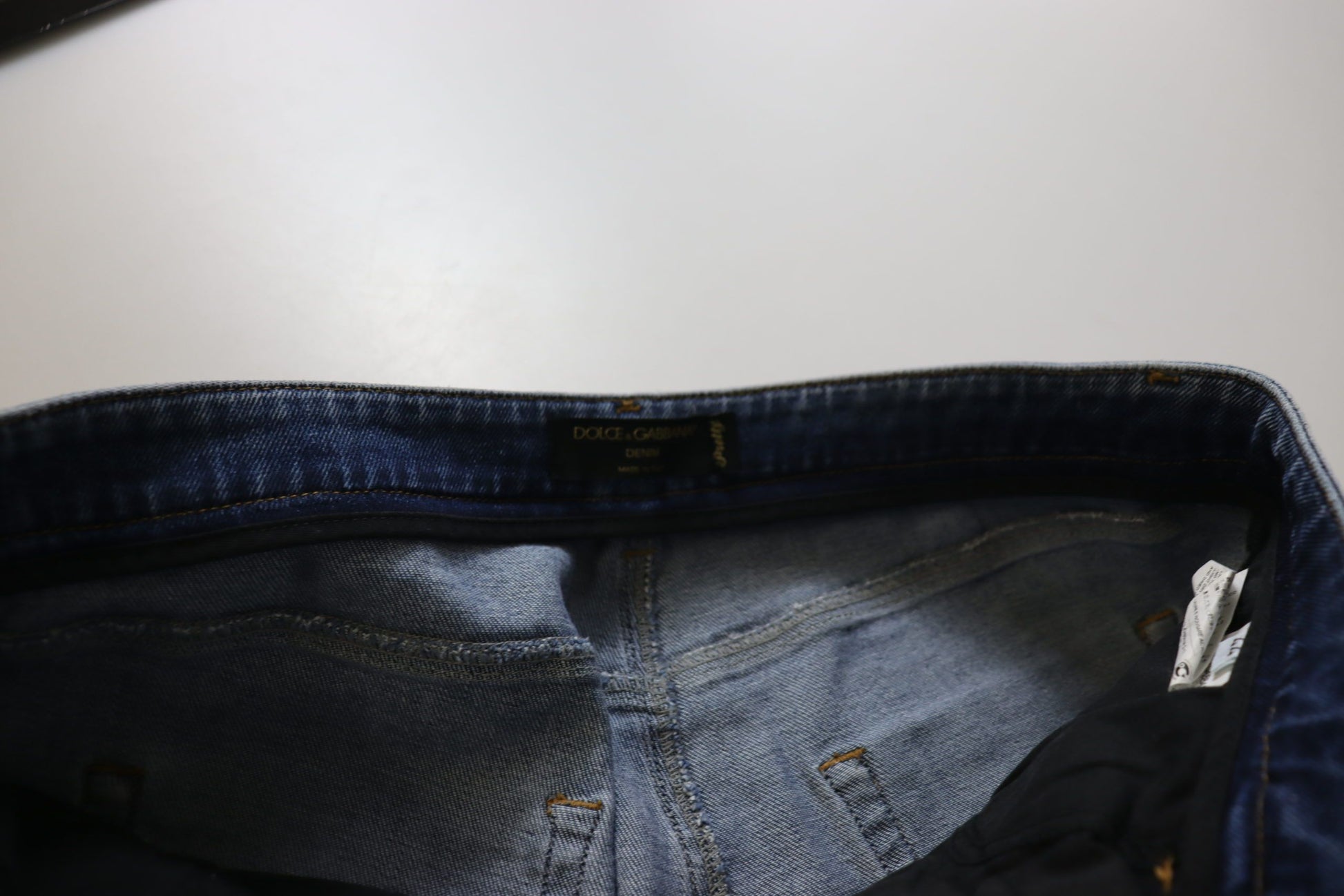 Blue denim jeans with zipper down front