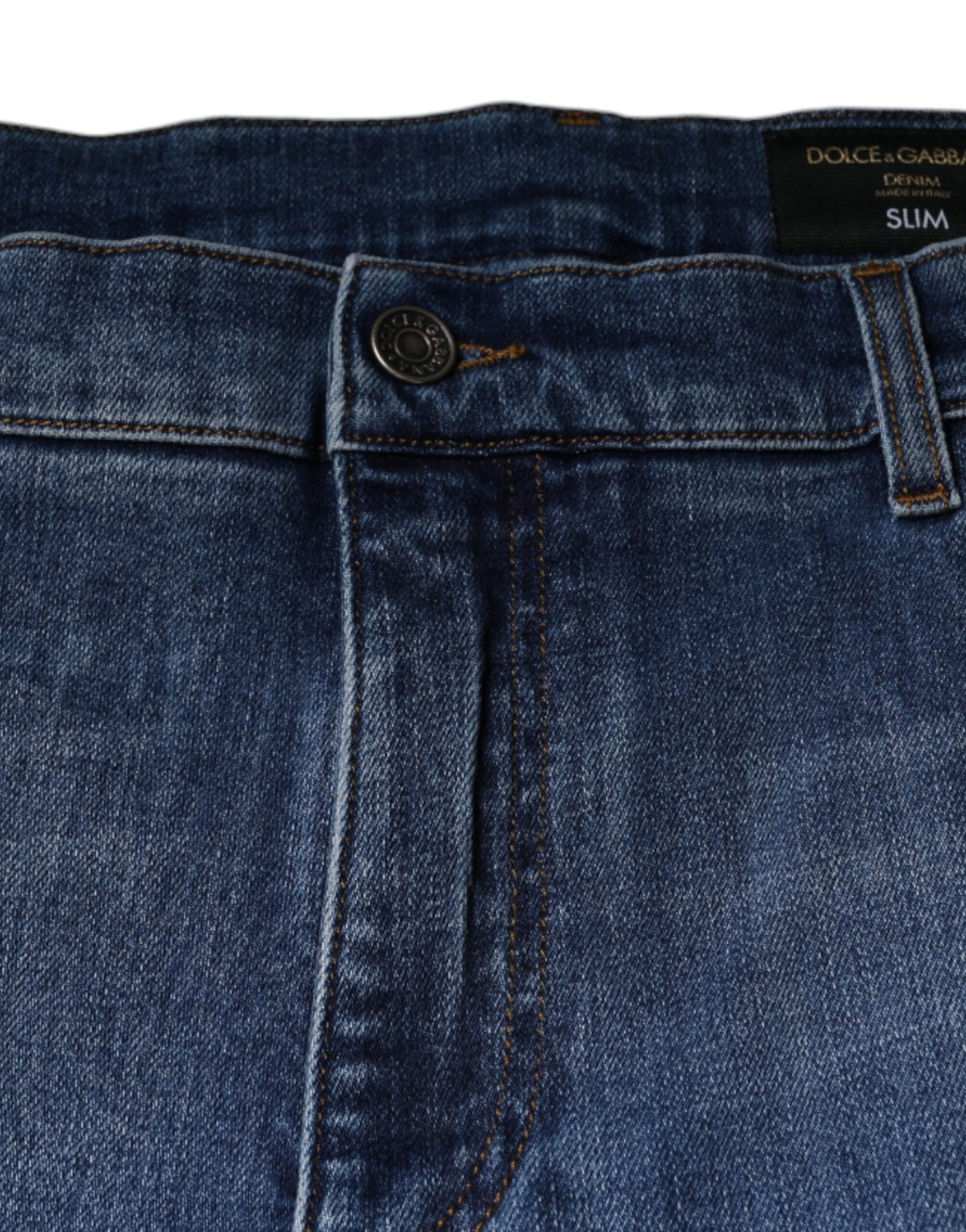 Blue denim jeans with button closure