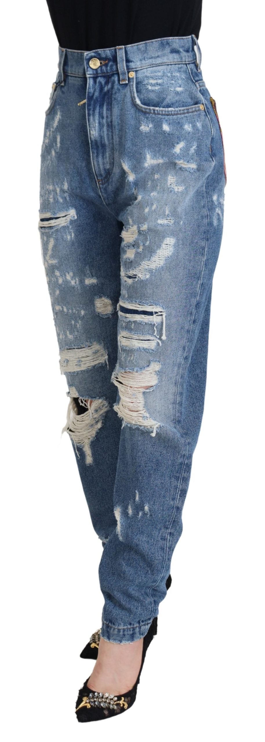 Woman wearing distressed blue jeans