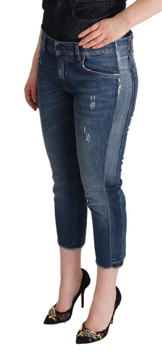 Woman wearing blue jeans with distressed details