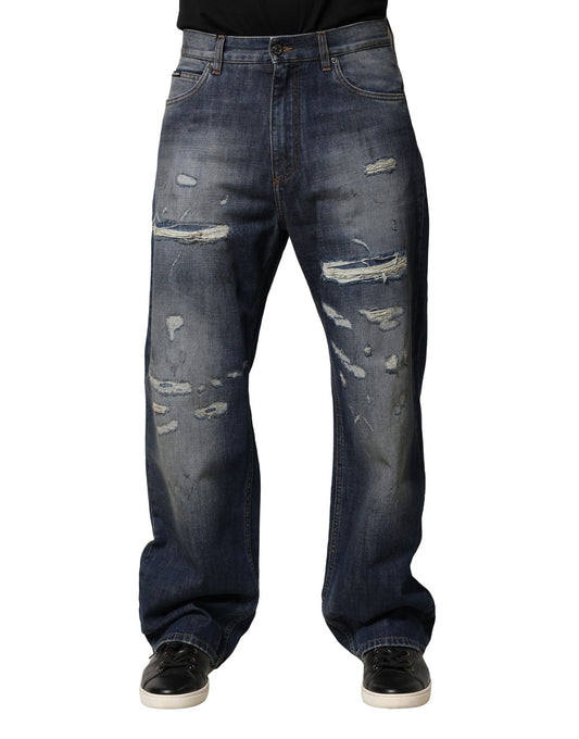 Pair of blue denim jeans with distressed areas