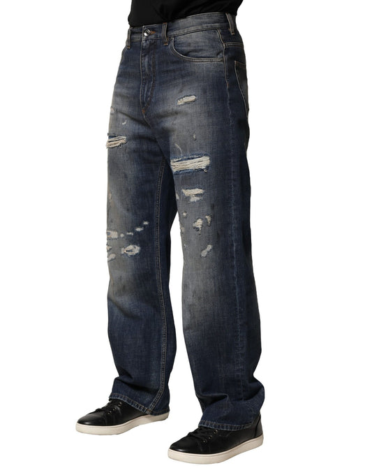 Pair of blue jeans with holes in knees