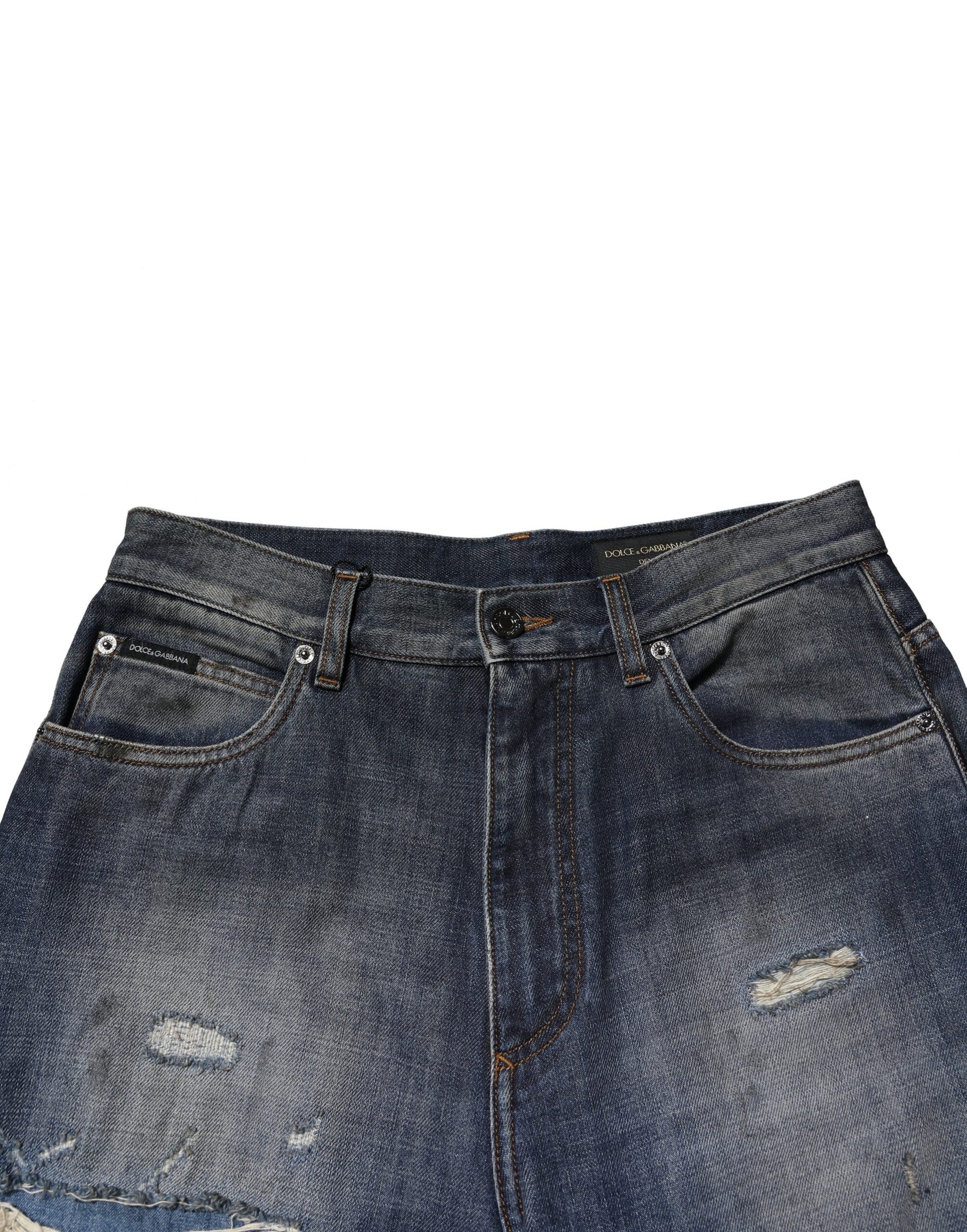 Pair of blue denim jeans with distressed details