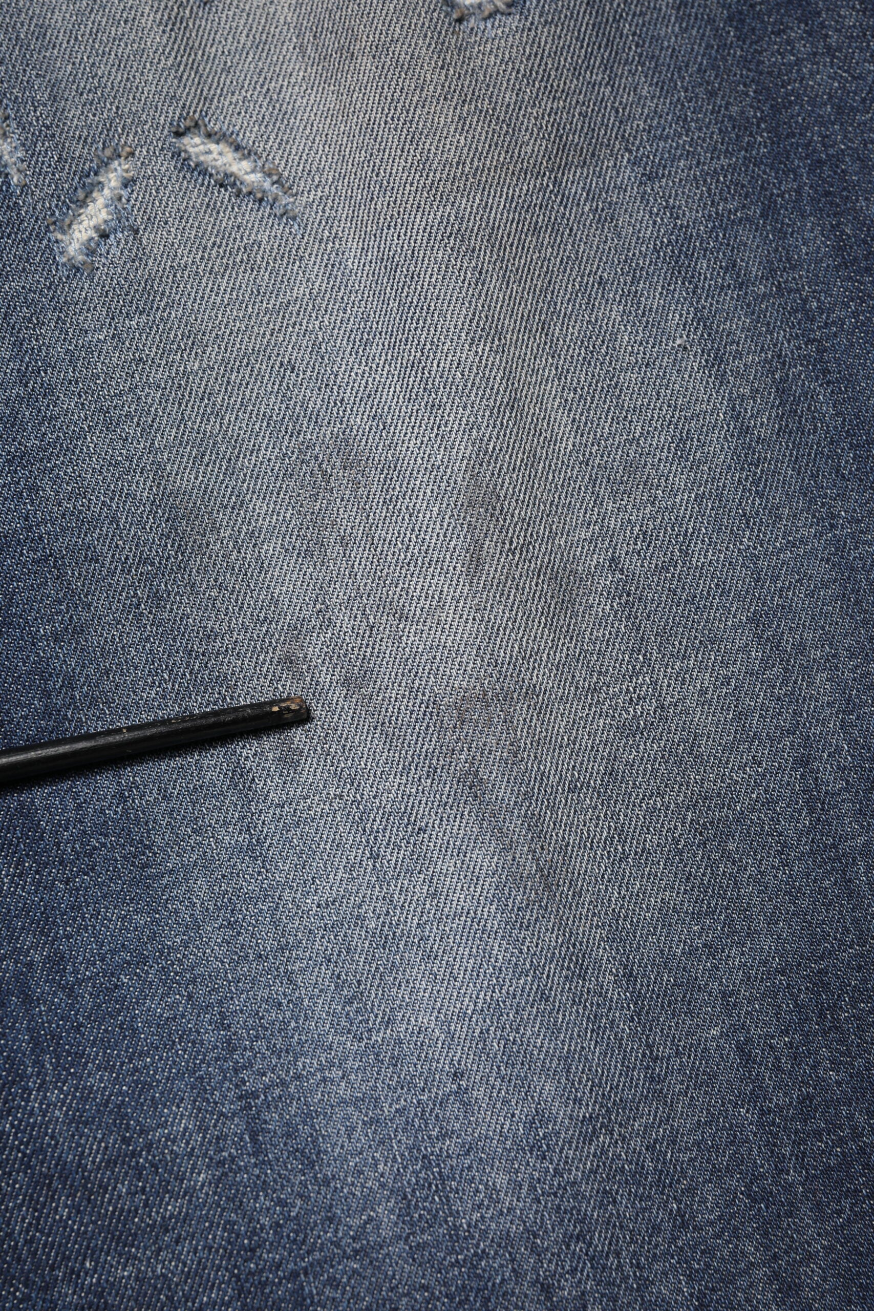 Denim jeans on a blue background