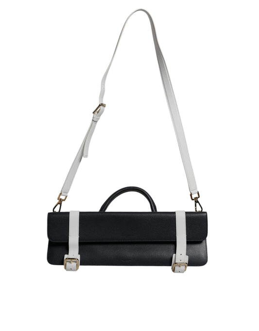 A black crossbody bag with white straps