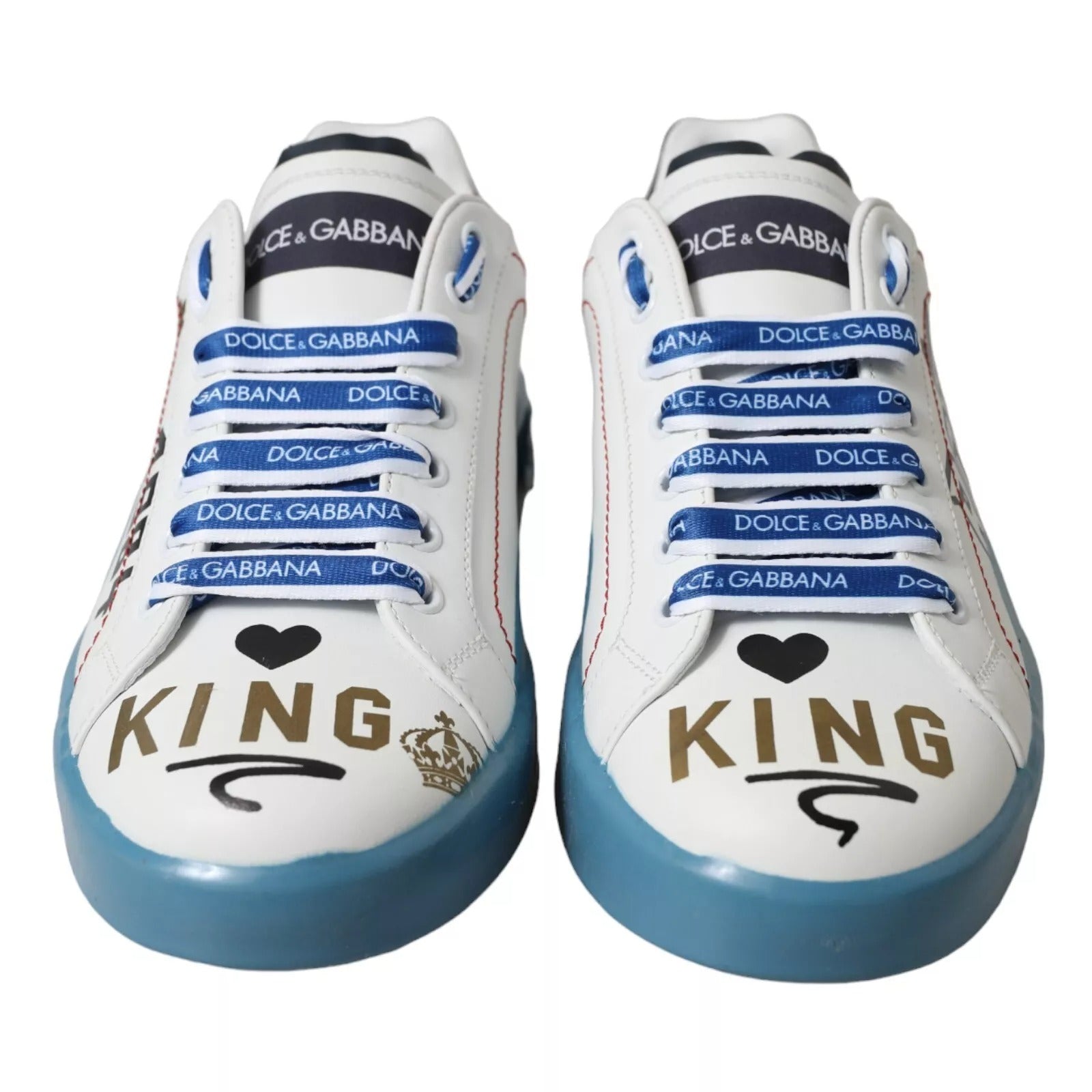 Pair of blue and white sneakers with brand logos and King written on side