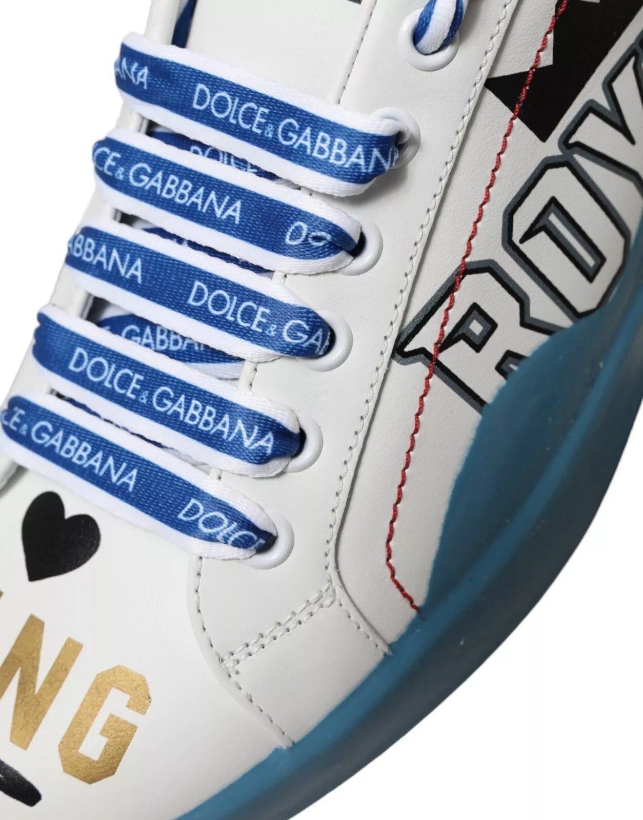 White sneaker with blue laces and brand logos on side