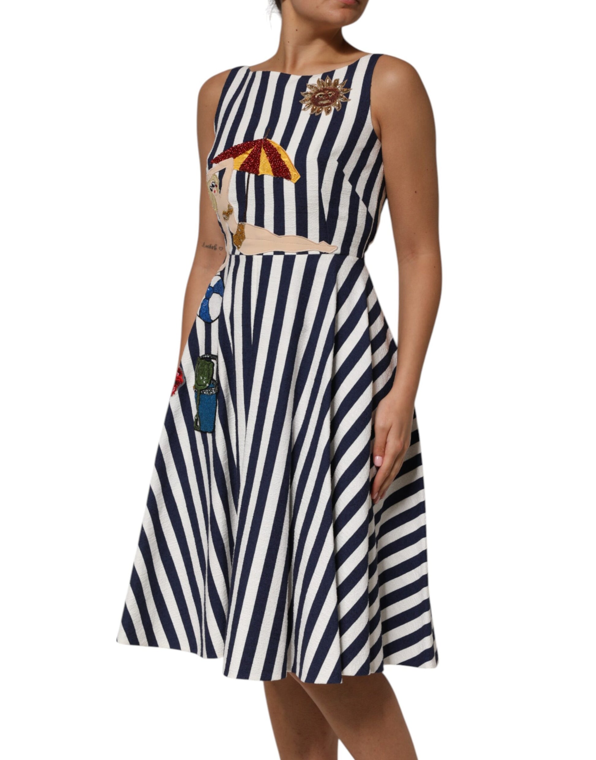 A-line dress with blue and white stripes, embroidery detail on bodice