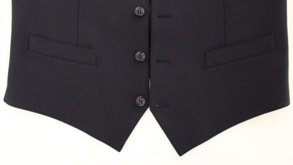 A black vest with two front pockets, part of a formal dress ensemble