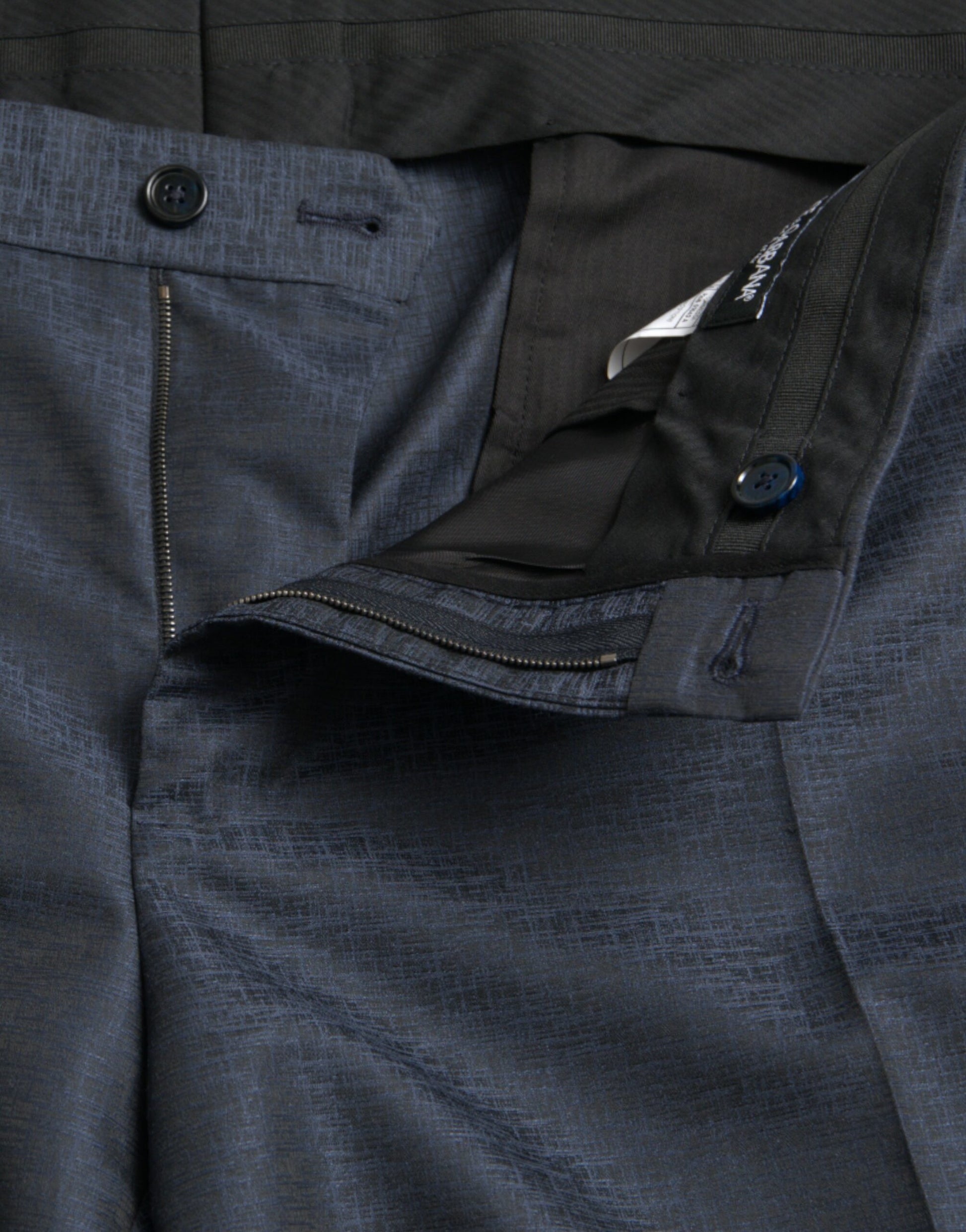 Dark blue wool dress pants with zippered pockets and waistband, from Dolce & Gabbana