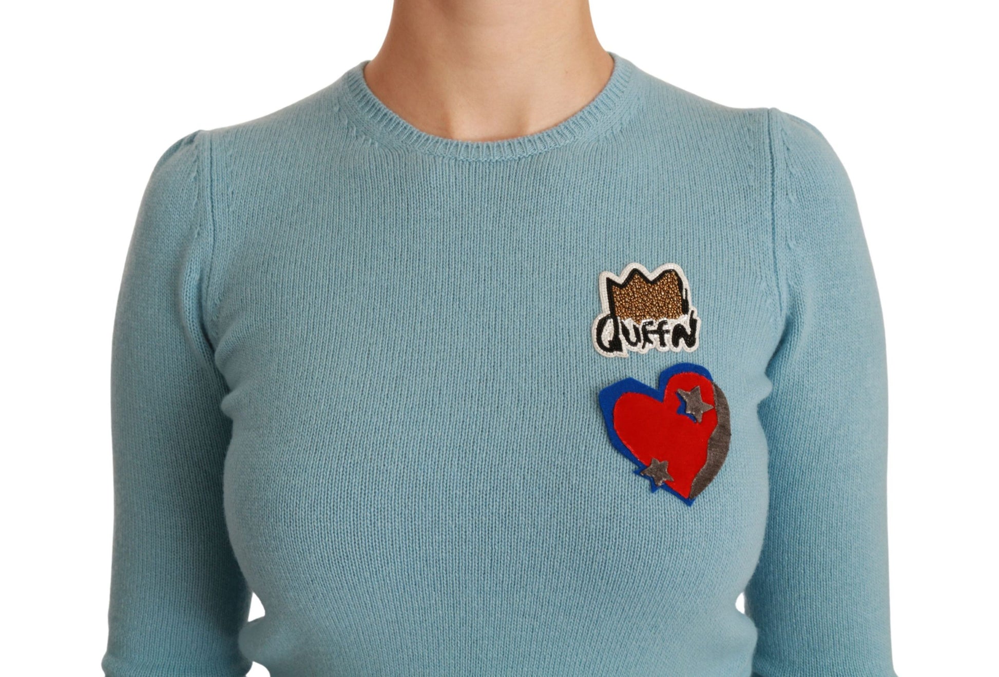 Blue sweater with heart design on front