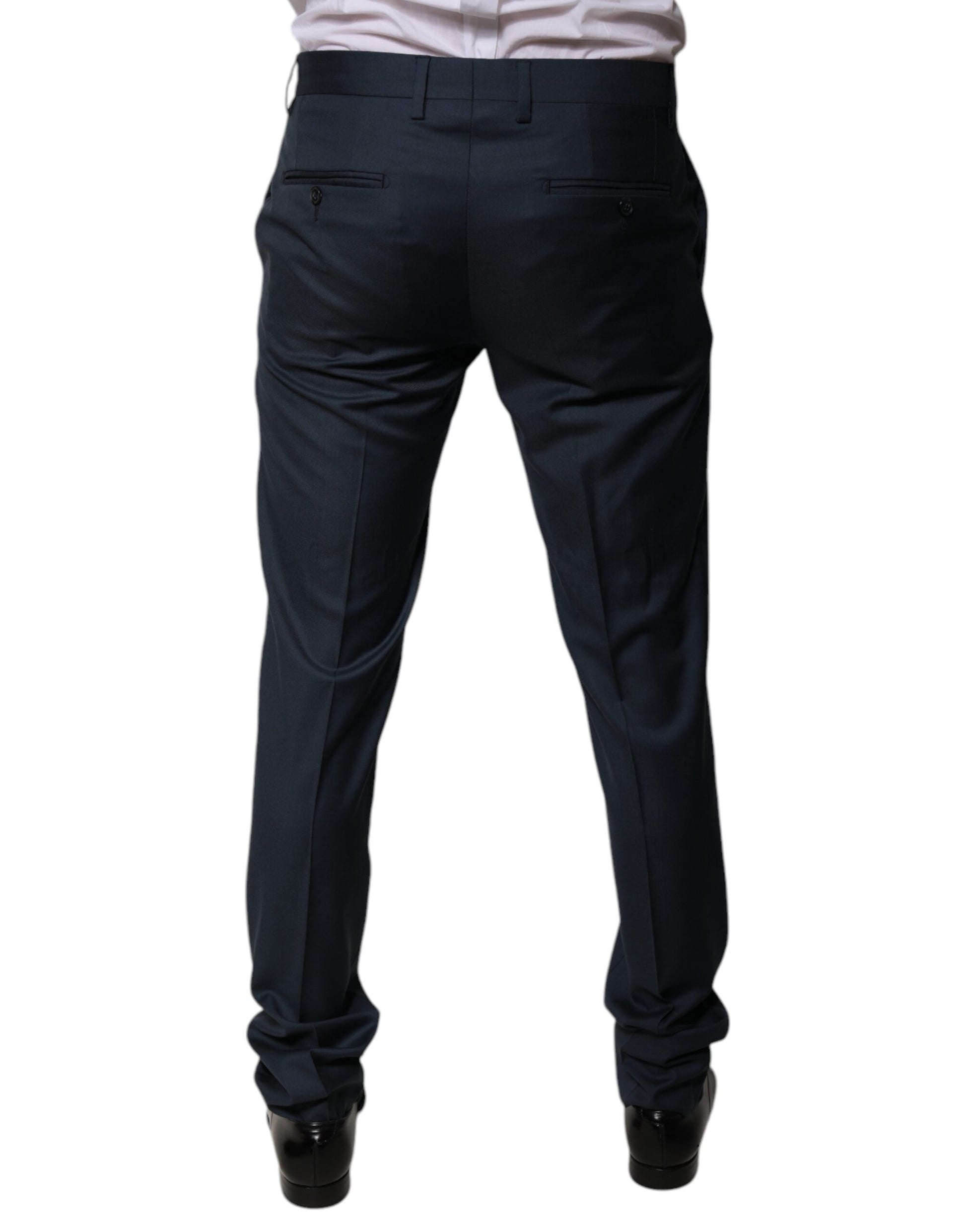 A pair of blue wool tapered formal dress pants by Dolce & Gabbana