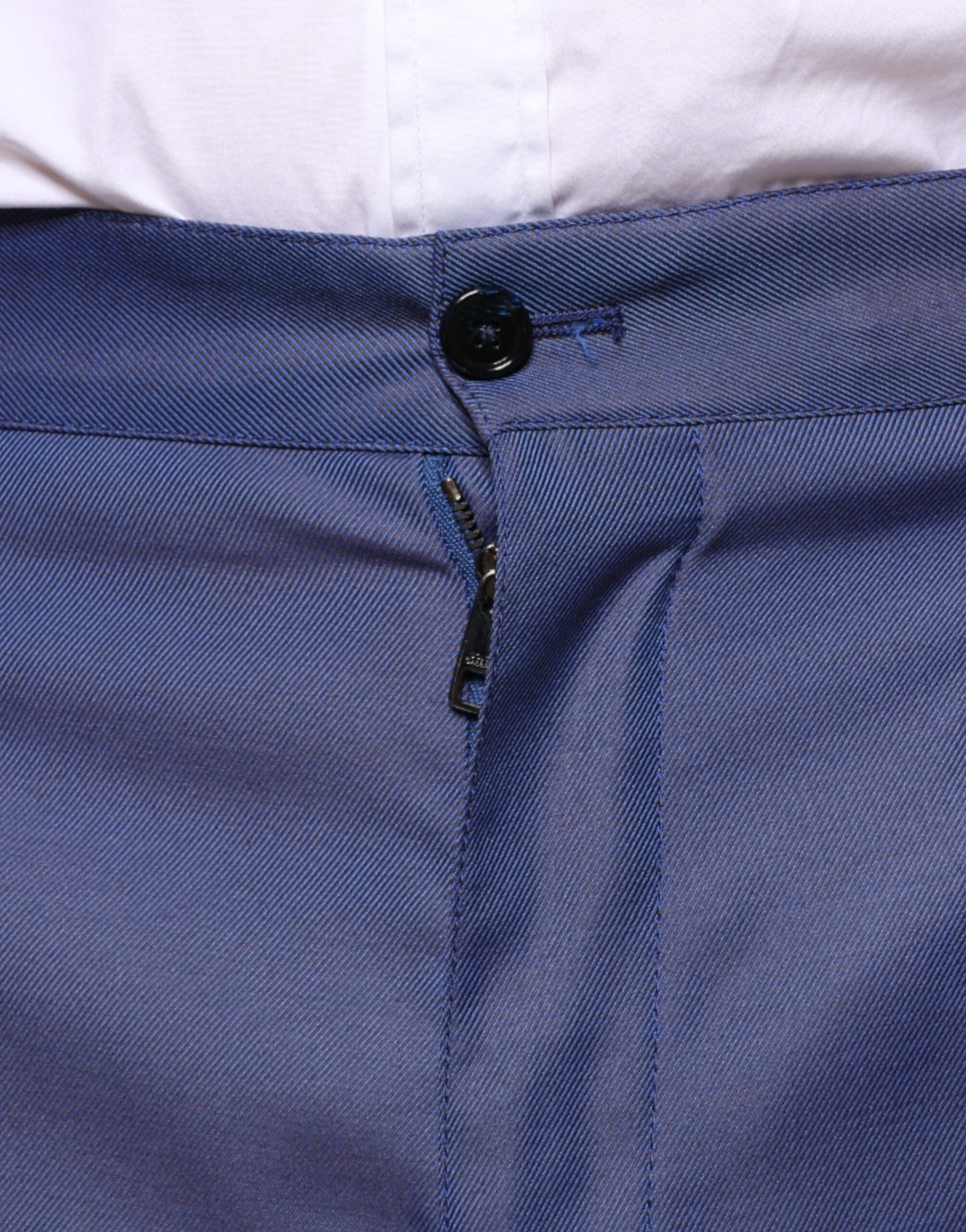A pair of blue wool tapered formal dress pants from the brand Dolce & Gabbana