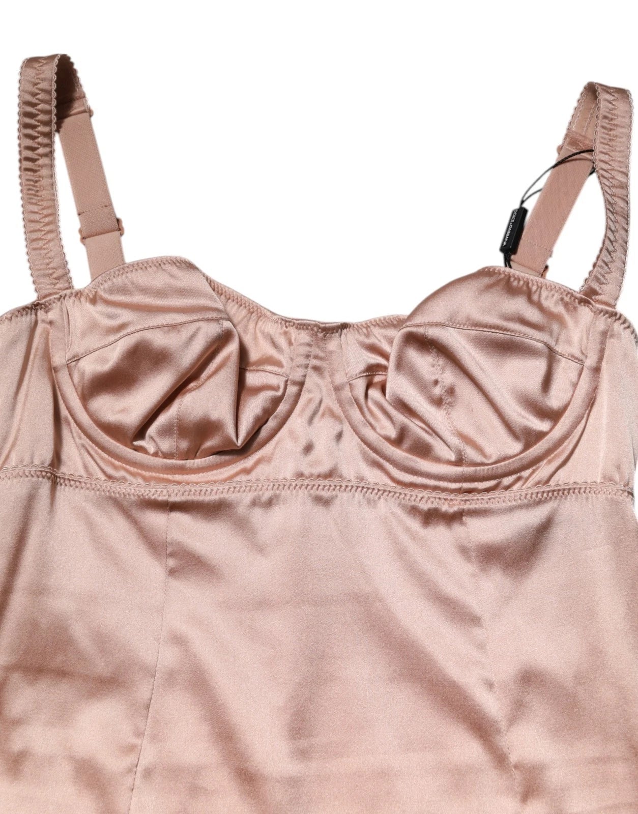 A pink satin bustier dress with a midi length