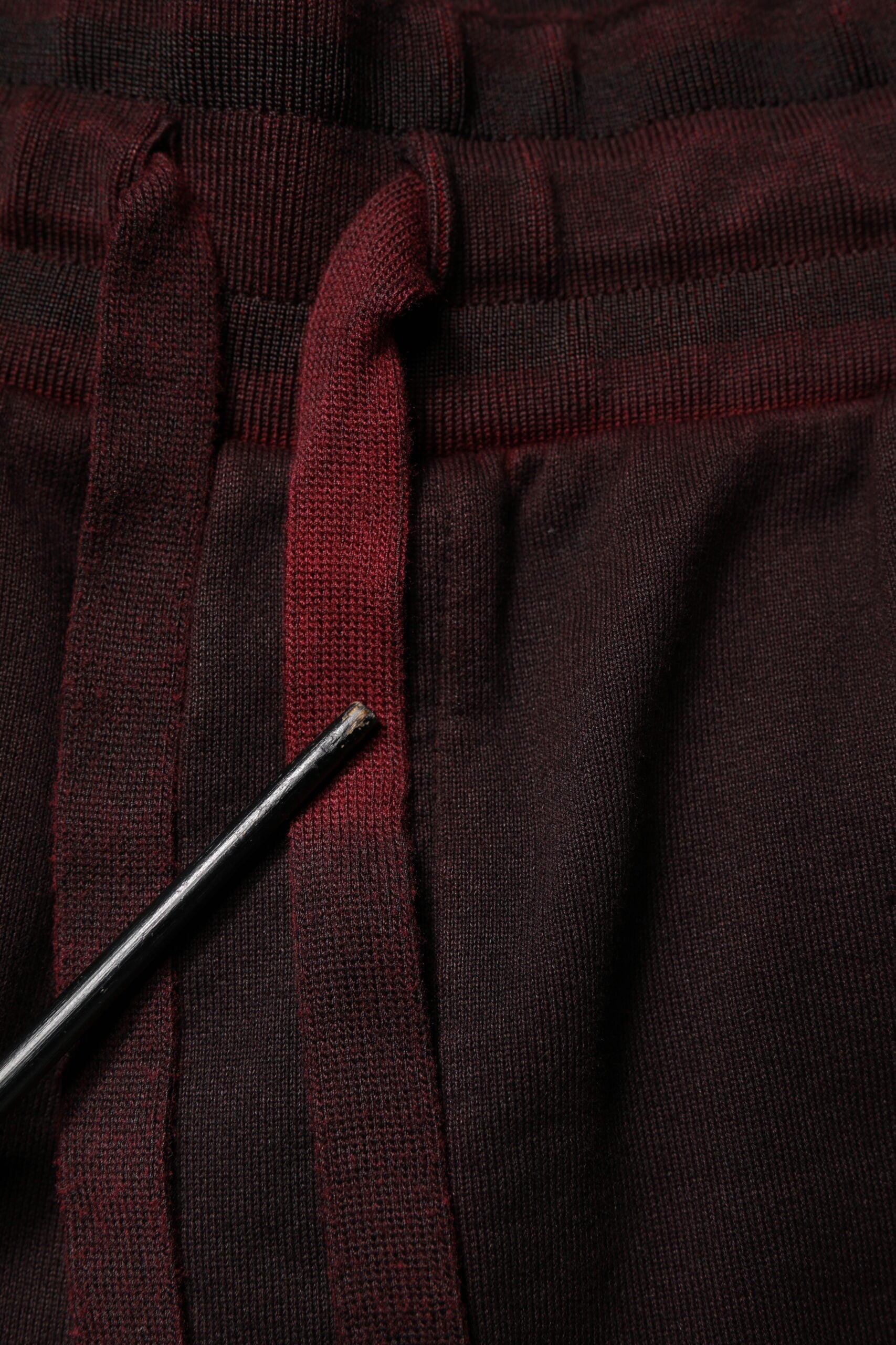 Red cotton bermuda shorts with black zipper detail