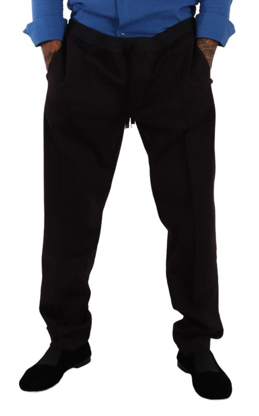 Man wearing black pants and blue shirt