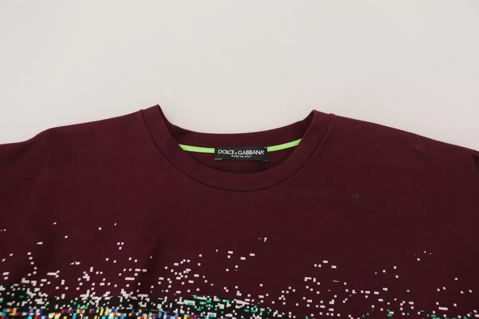 Maroon t-shirt with colorful pattern on front