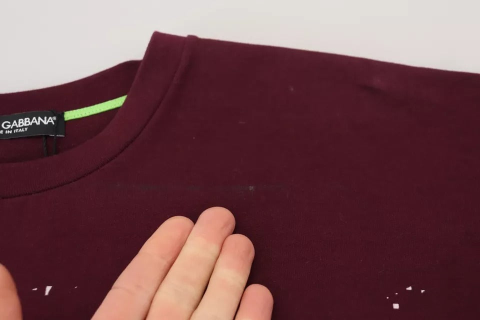 Maroon t-shirt on hanger