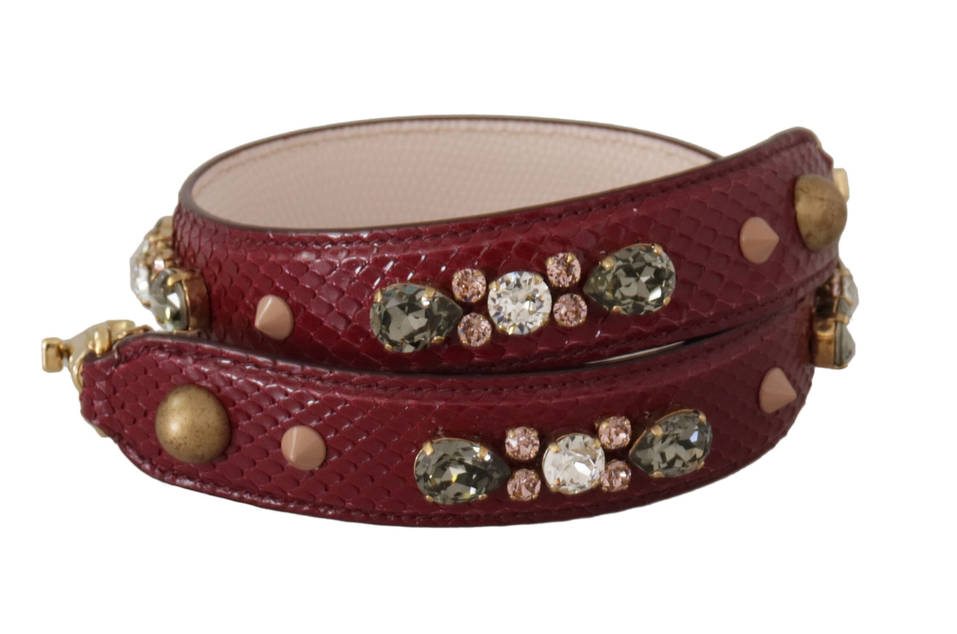 Red bracelet with gold accents and sparkling stones