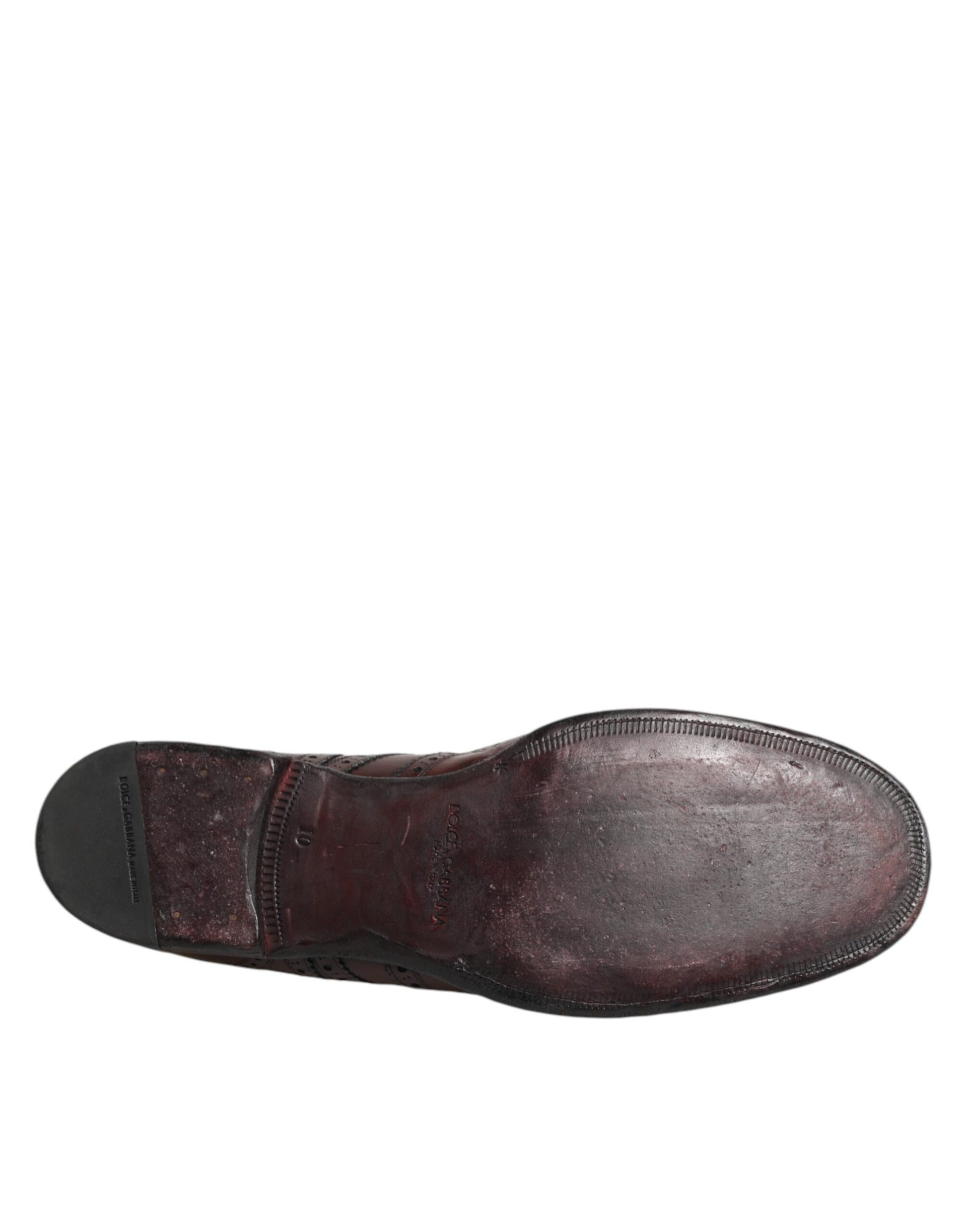 A single brown leather shoe with laces, featuring a stitched design on the side