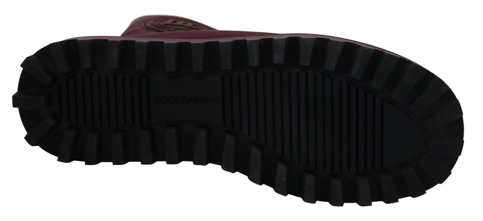 Pair of black and red hiking boots with a deep tread pattern