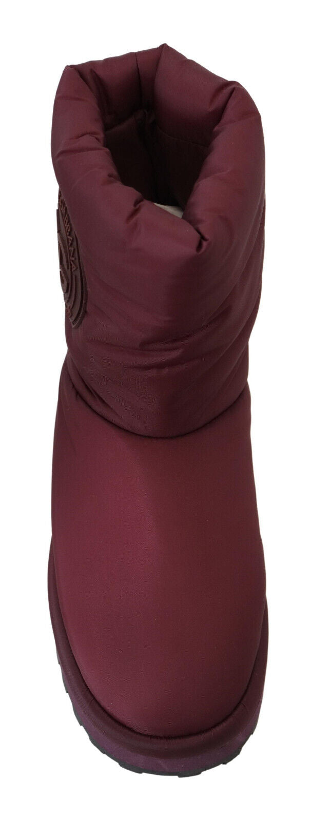 Red boot with zipper closure and pull tab