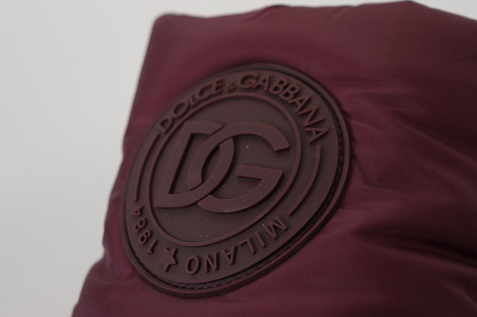 Purple fabric with embossed logo