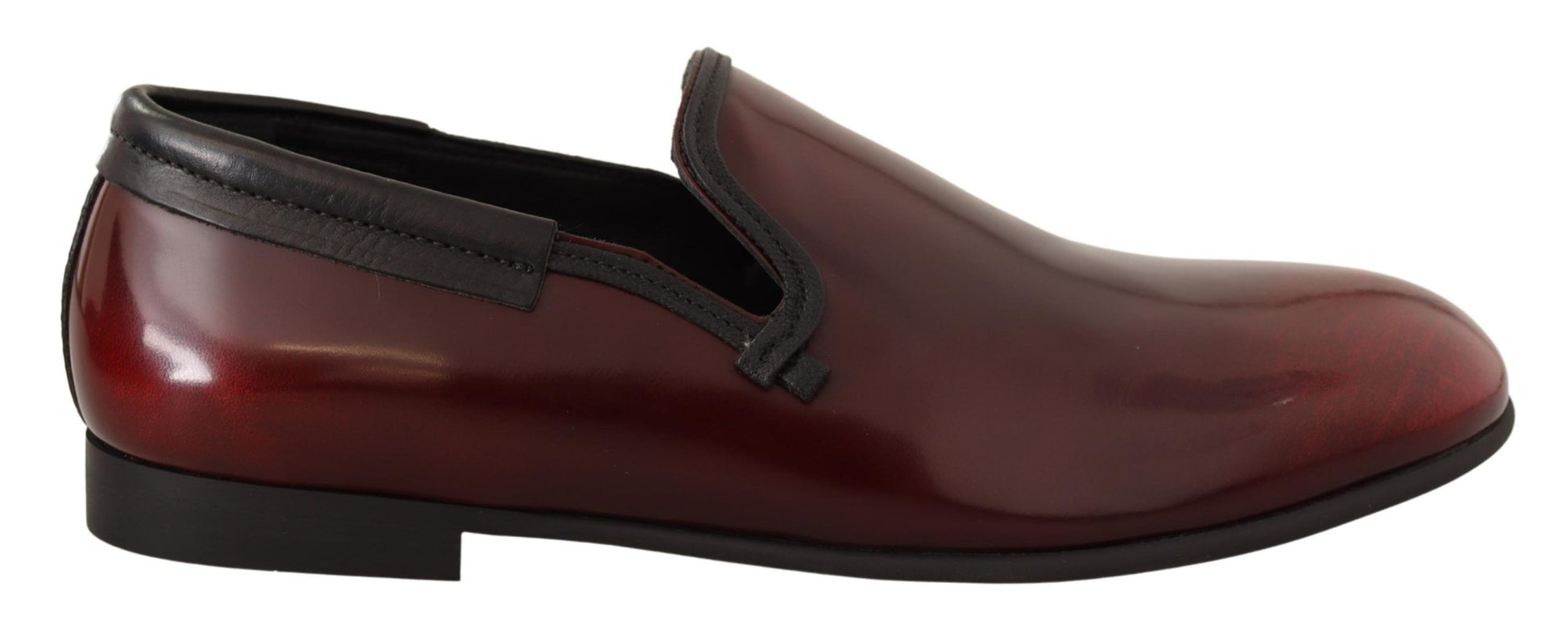 Red leather men's dress shoe with black laces and sole