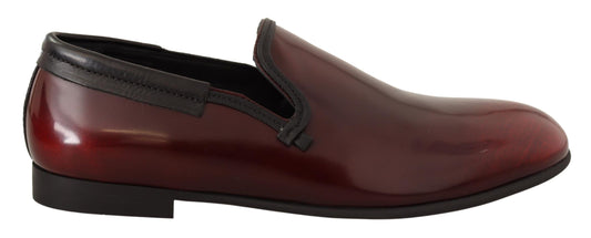 Red leather men's dress shoe with black laces and sole