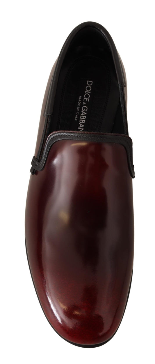 Red shoe with black heel and toe