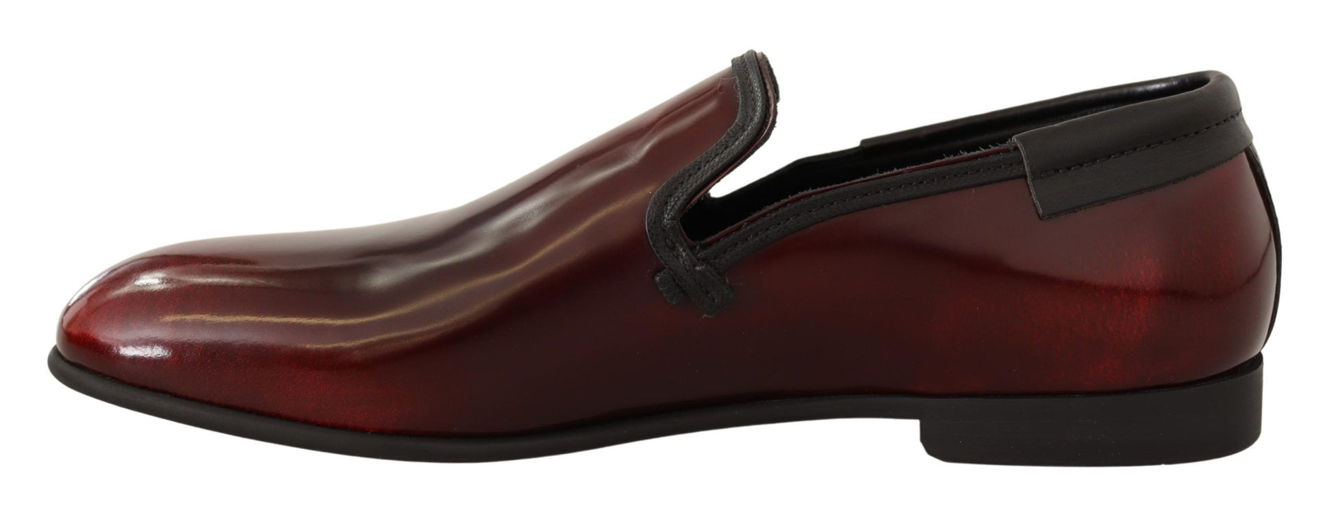 Red leather shoes with laces and a bow tie