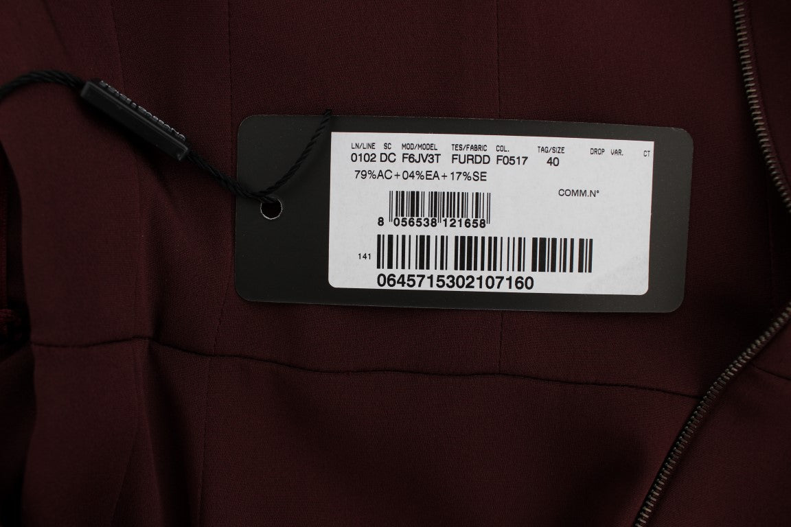 Black tag on jacket with white lettering