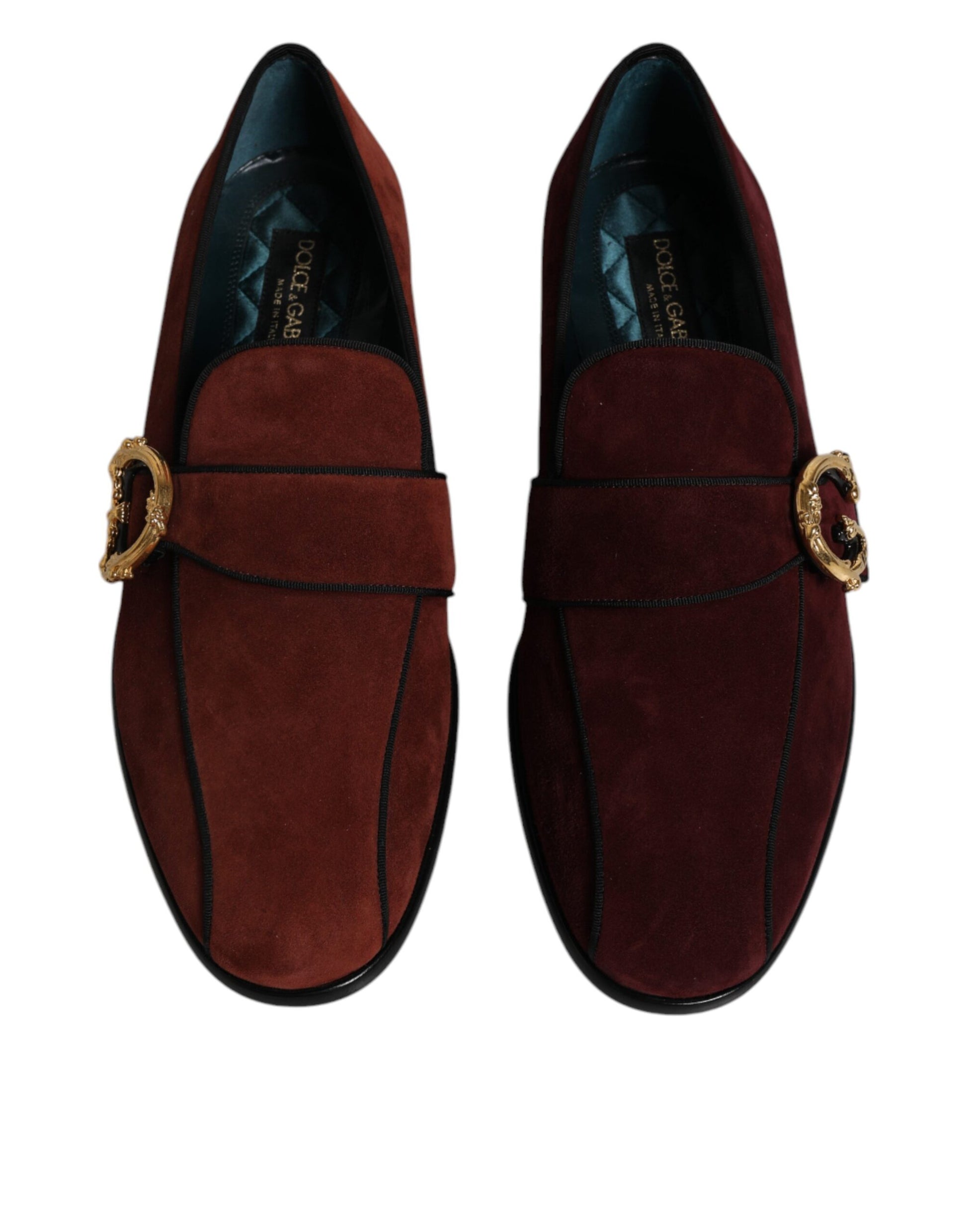 Pair of red suede loafers with gold buckle, formal men's dress shoes