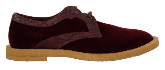 Red velvet loafer shoes with gold accents and tan soles