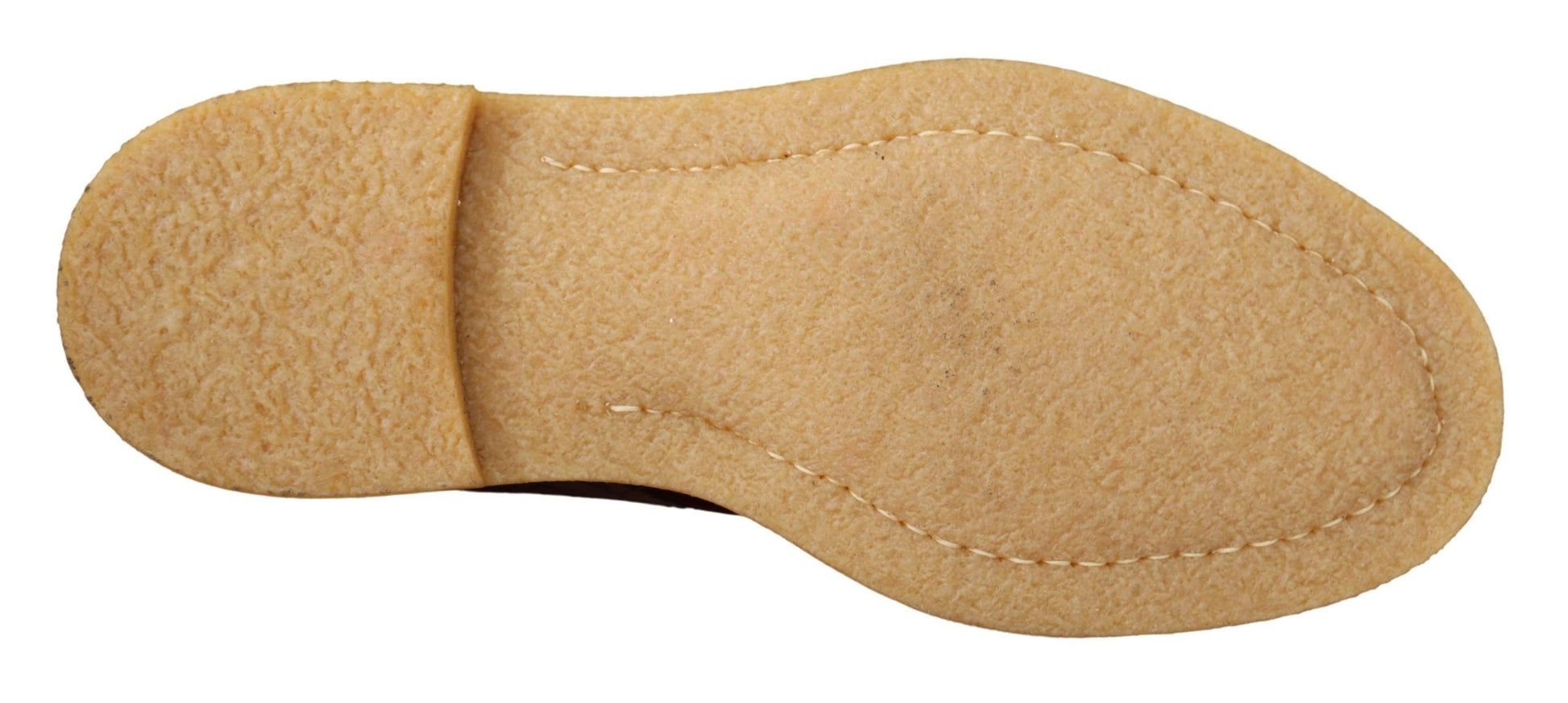 Two brown dog shoes with a seam down the middle