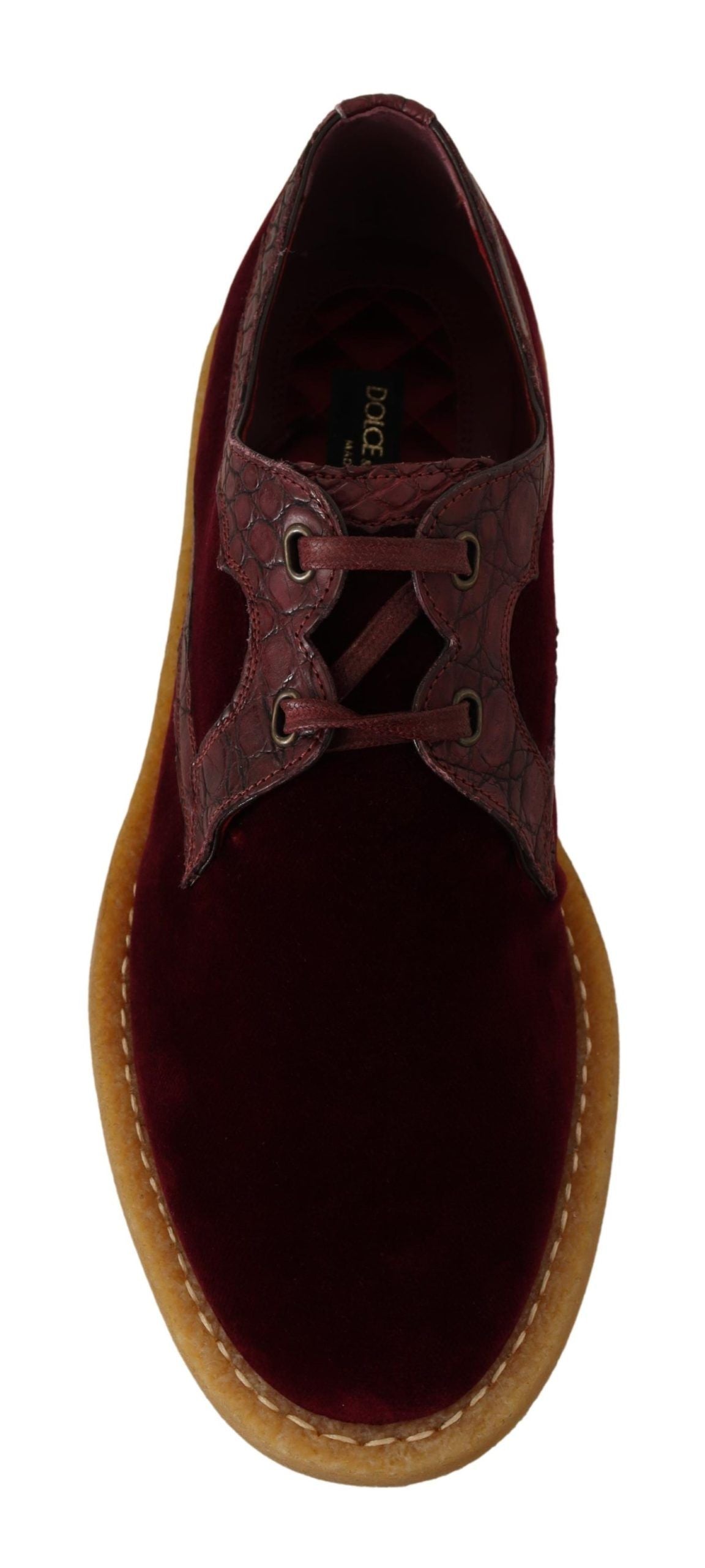 Red velvet loafer shoe with brown sole and laces