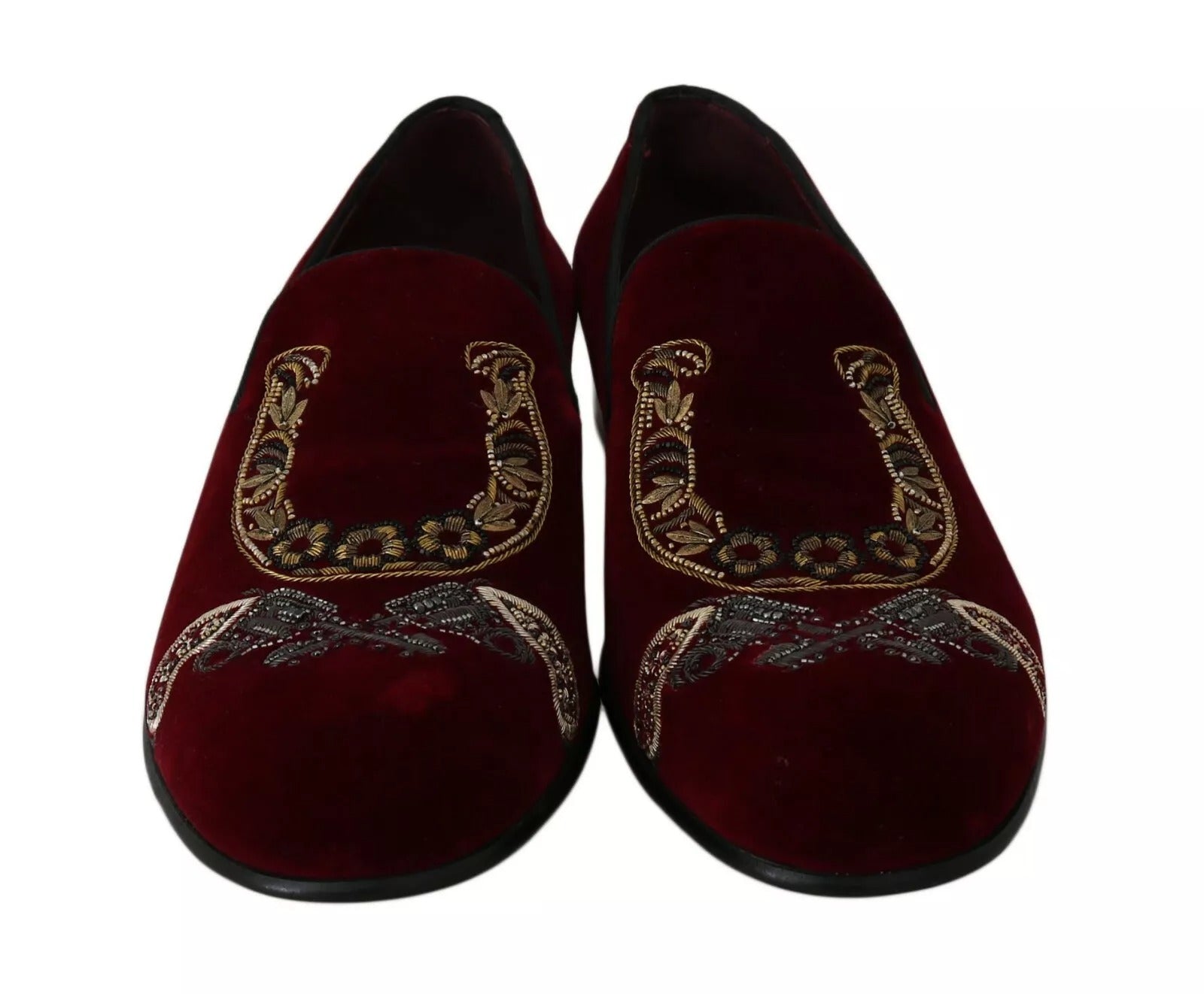 Pair of red velvet slippers with gold embroidery and tassels