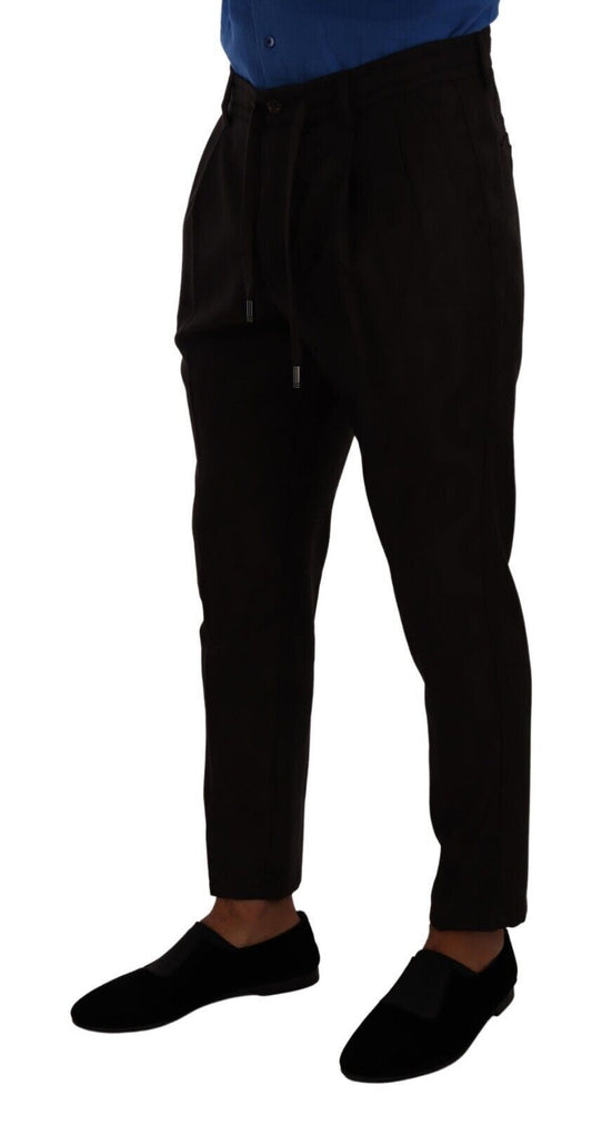 Pair of black dress pants with a crease down the front