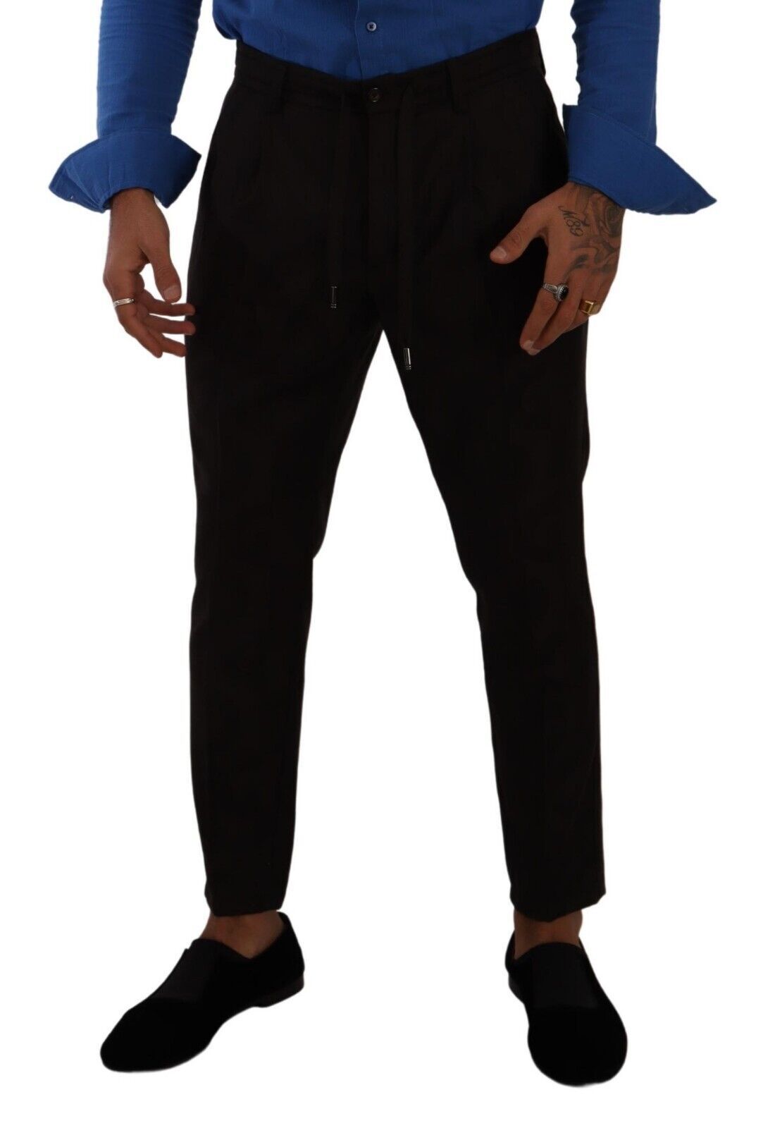 Man wearing blue shirt and black pants