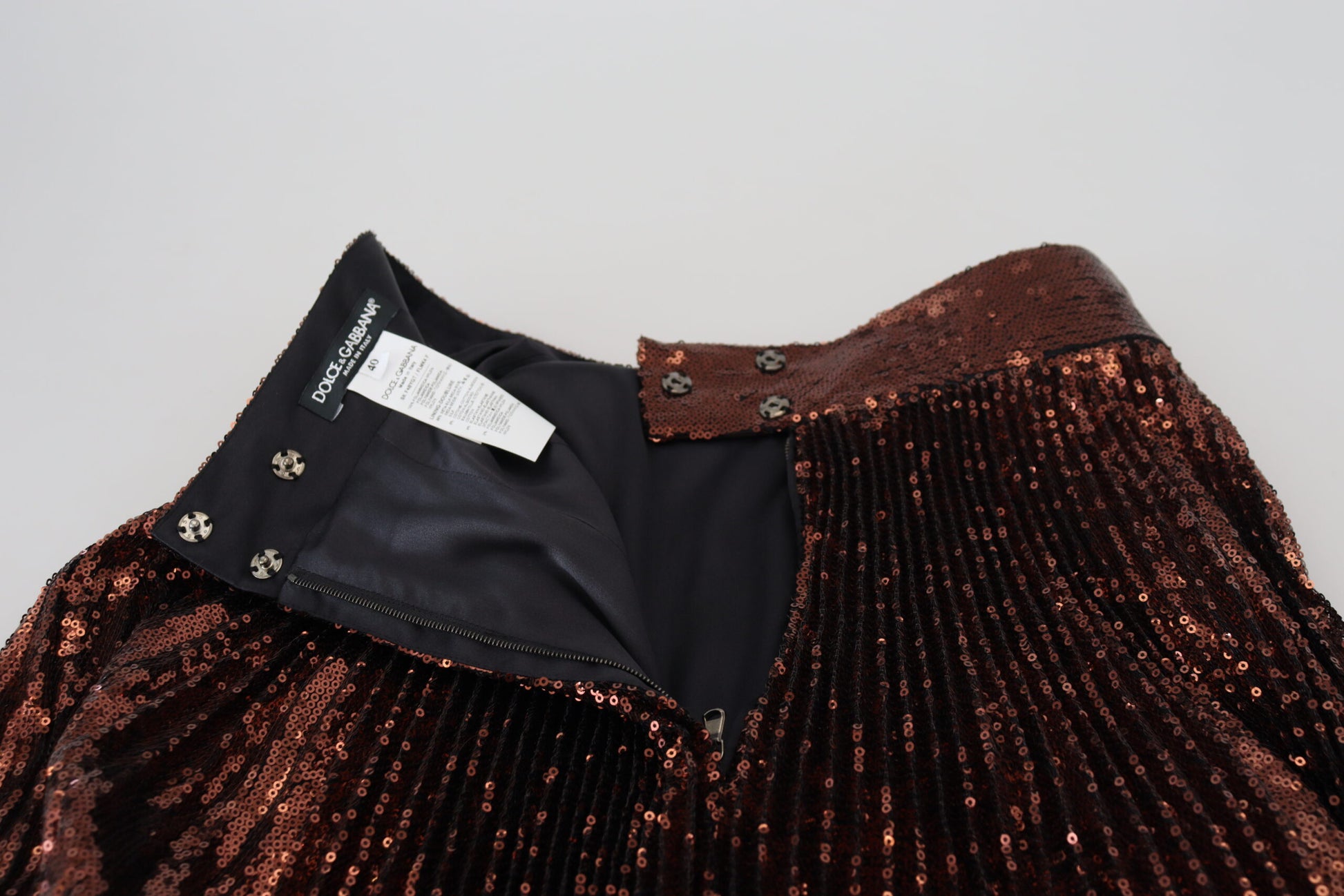 Black leather jacket with red sequins on sleeve