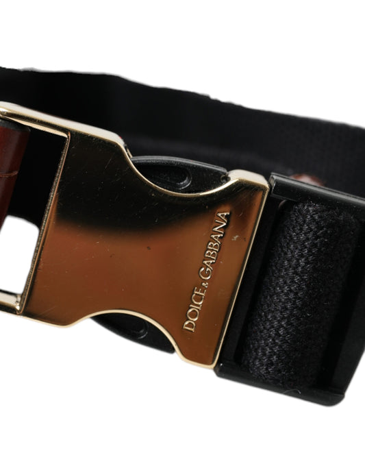 Gold buckle on black strap