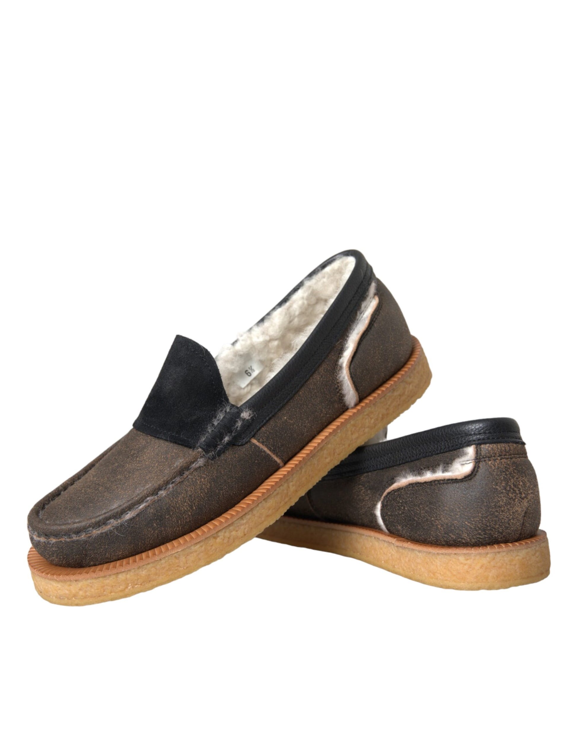 Pair of brown loafers with black accents