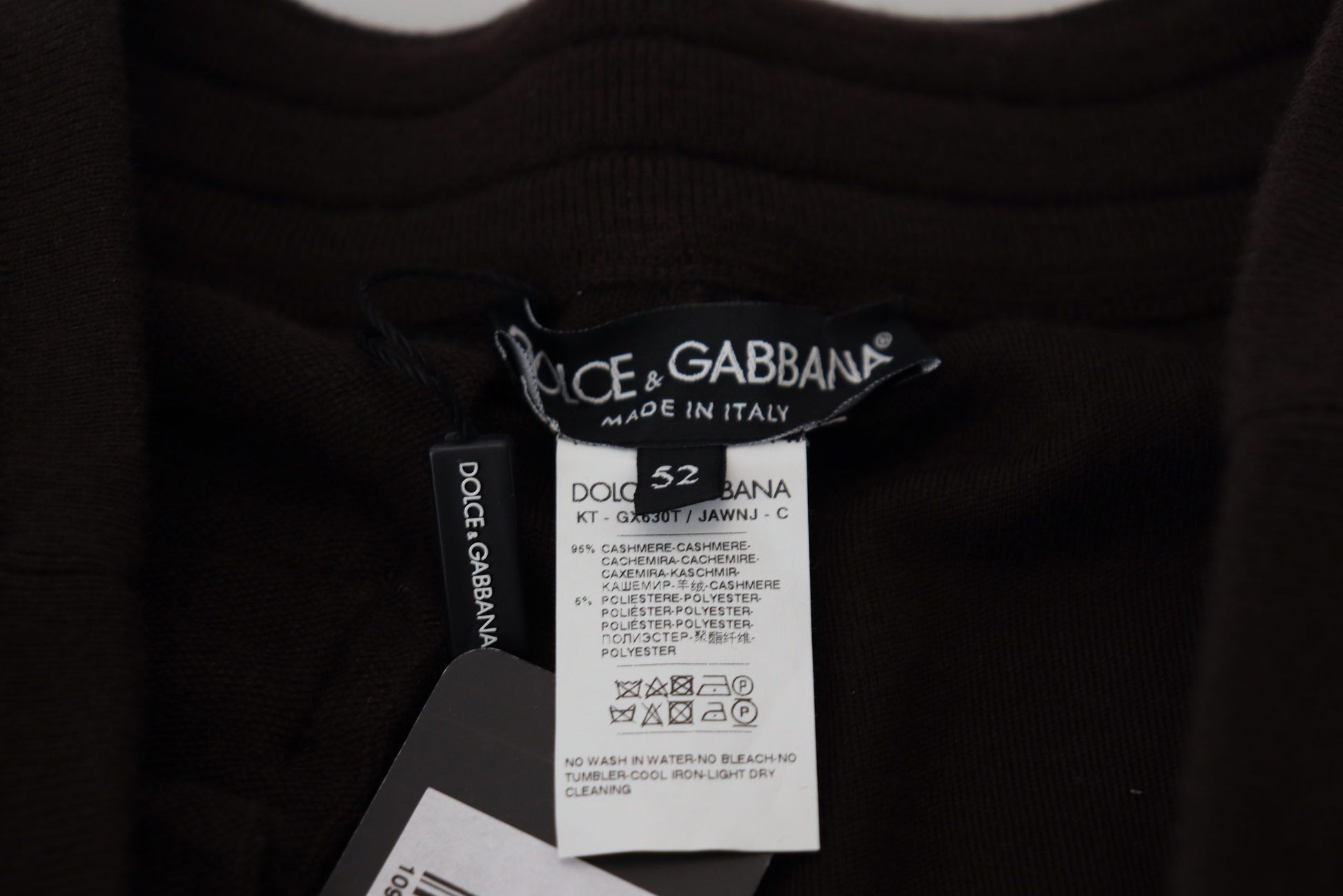 Brown sweater with black tag