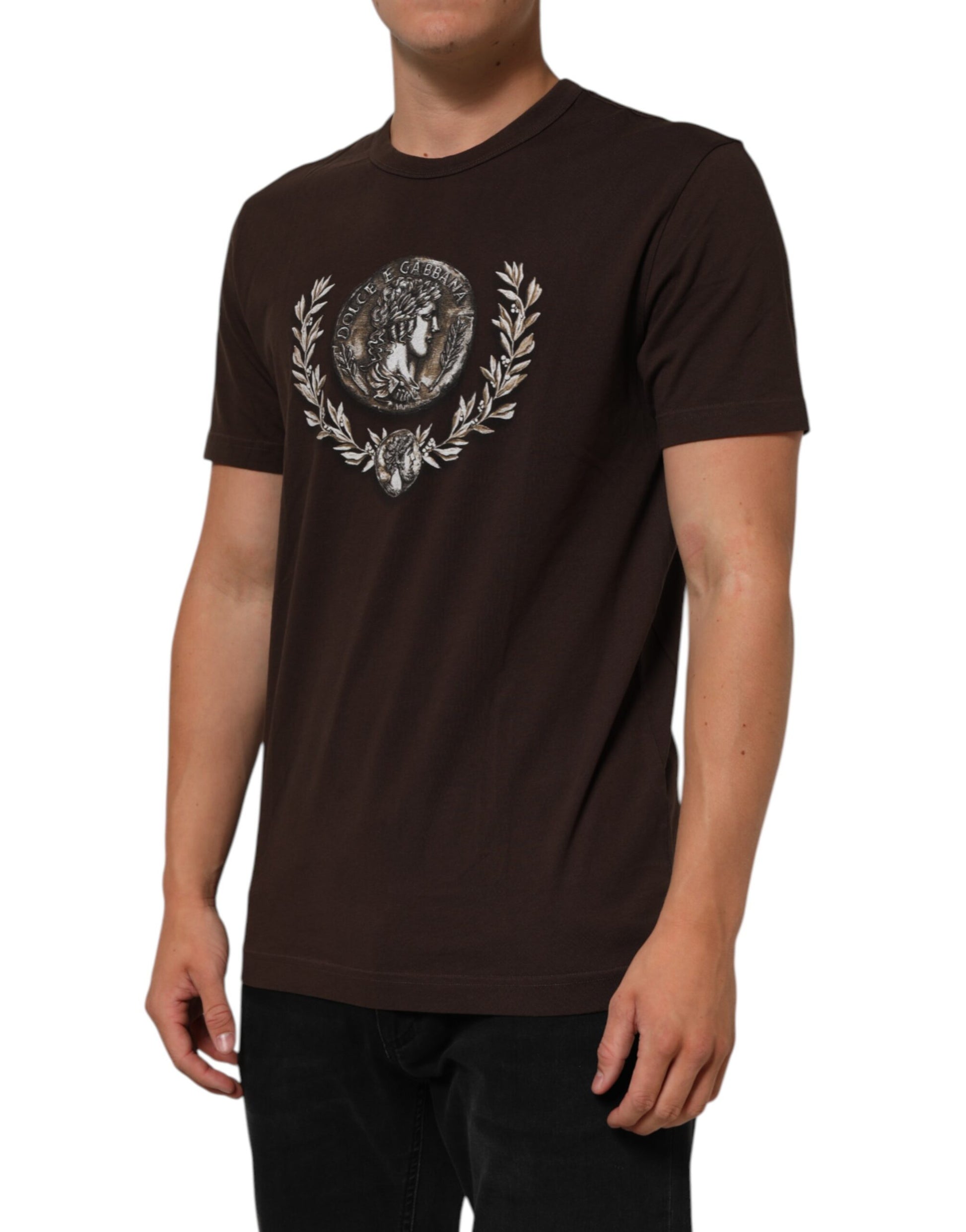 Man wearing brown t-shirt with graphic design on front