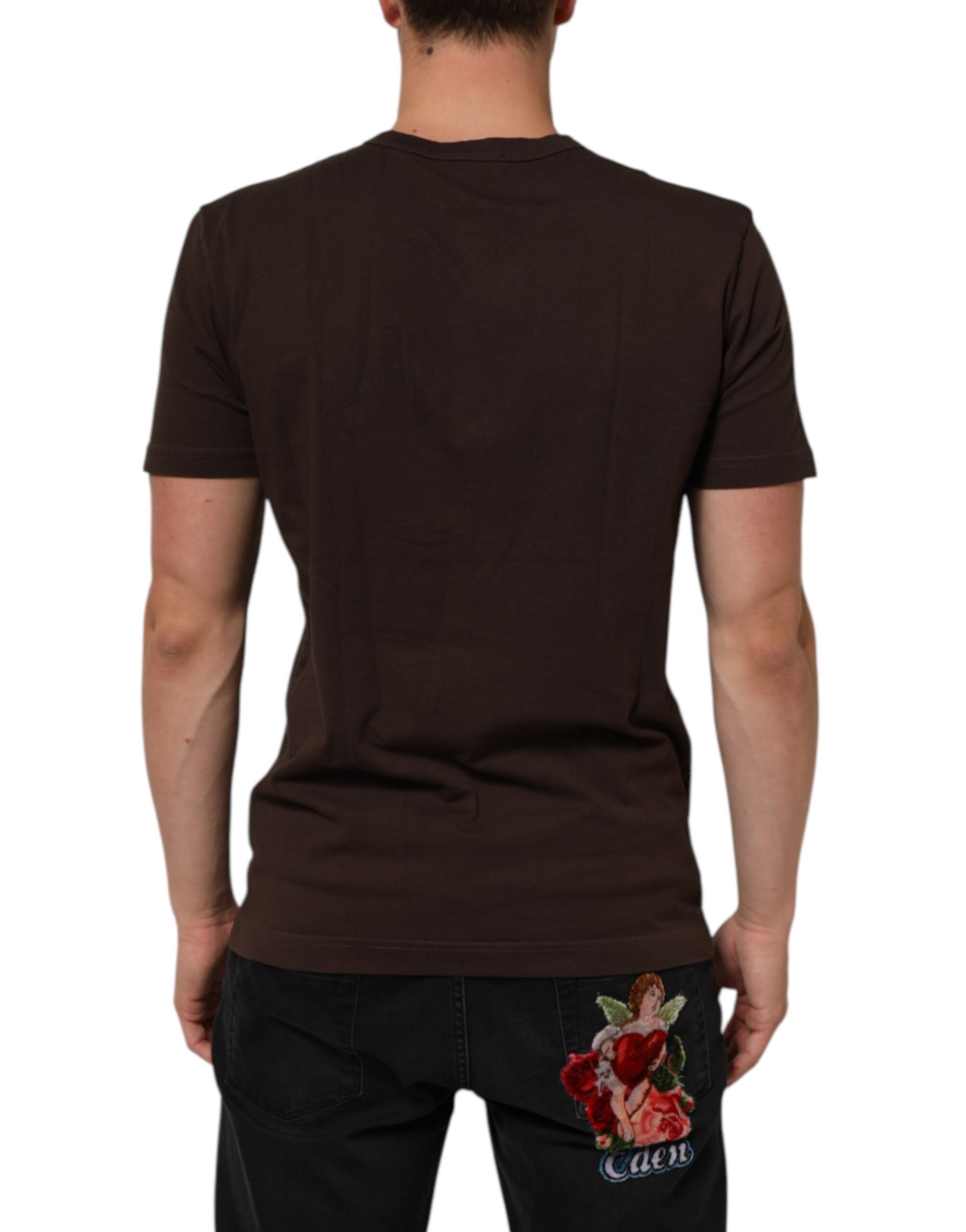 Man wearing brown t-shirt with red rose on back
