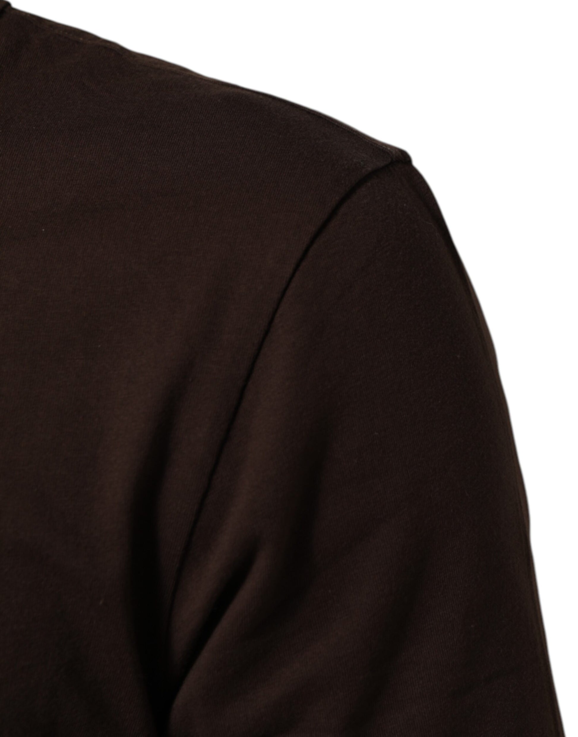 Sleeve of dark colored sweater