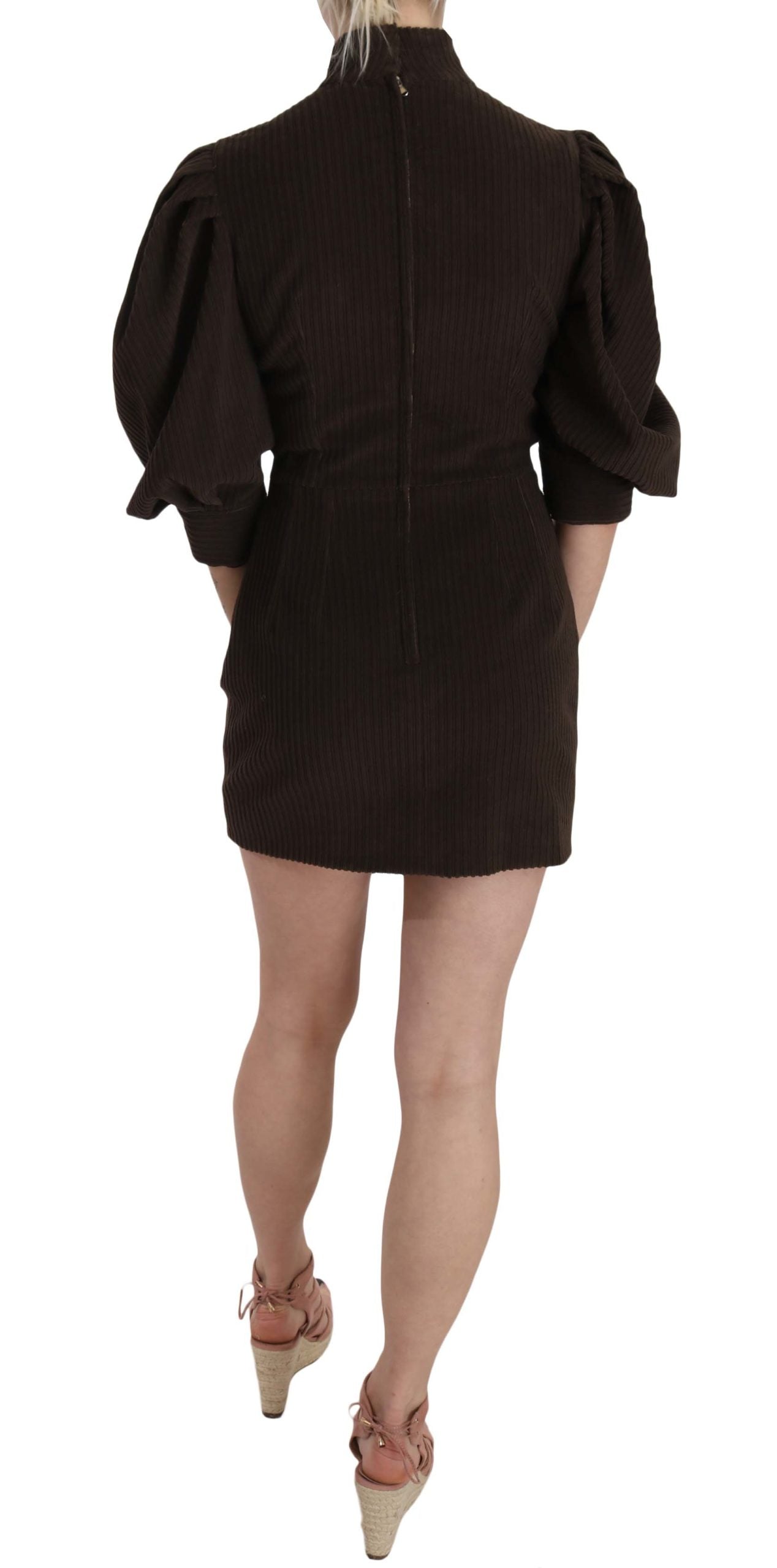 A black bodycon dress with short sleeves and a high neckline