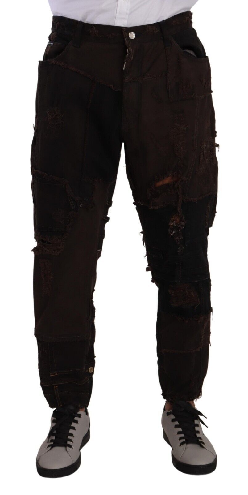 Mannequin wearing brown pants and black shoes