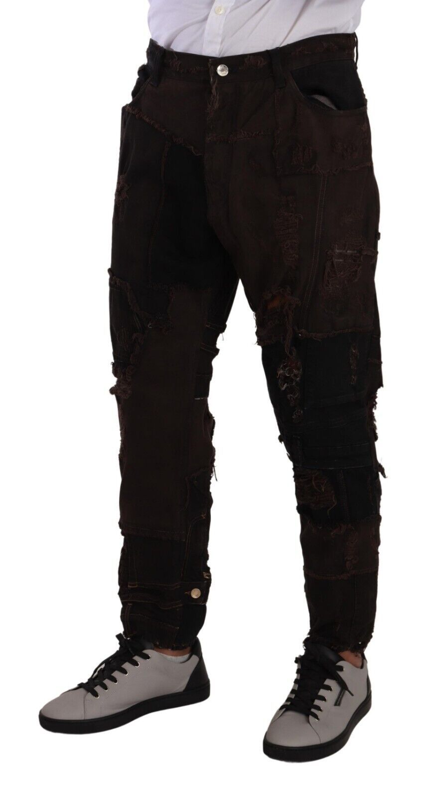 Man wearing brown pants and black shoes