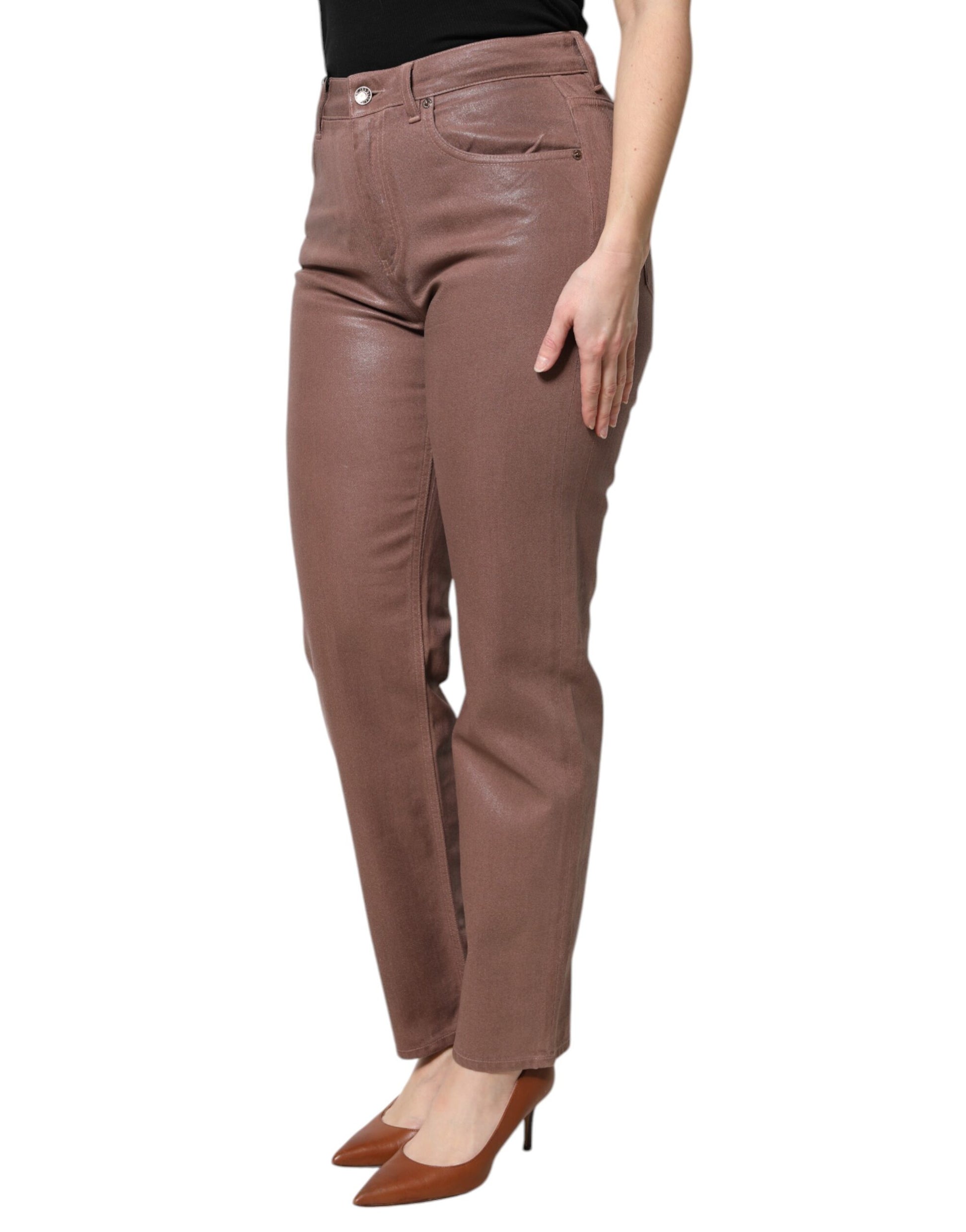 Woman wearing brown pants and black top
